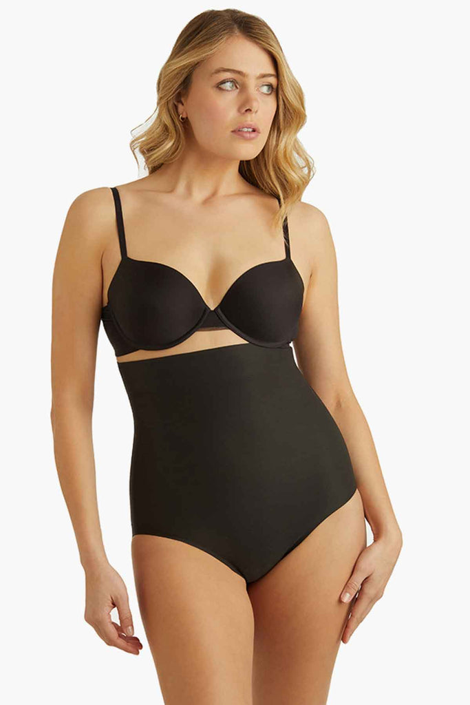 Woman in a high waisted shapewear.
