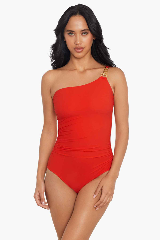 Woman in a stylish one piece swim suit.