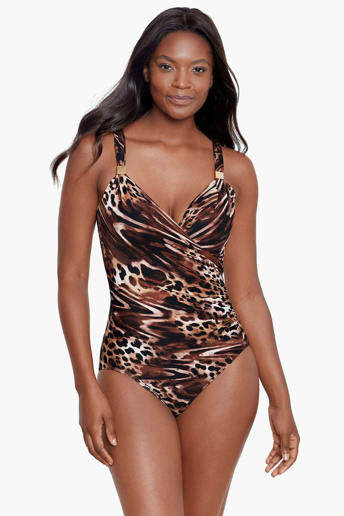 An african american woman wearing one piece swim dress.