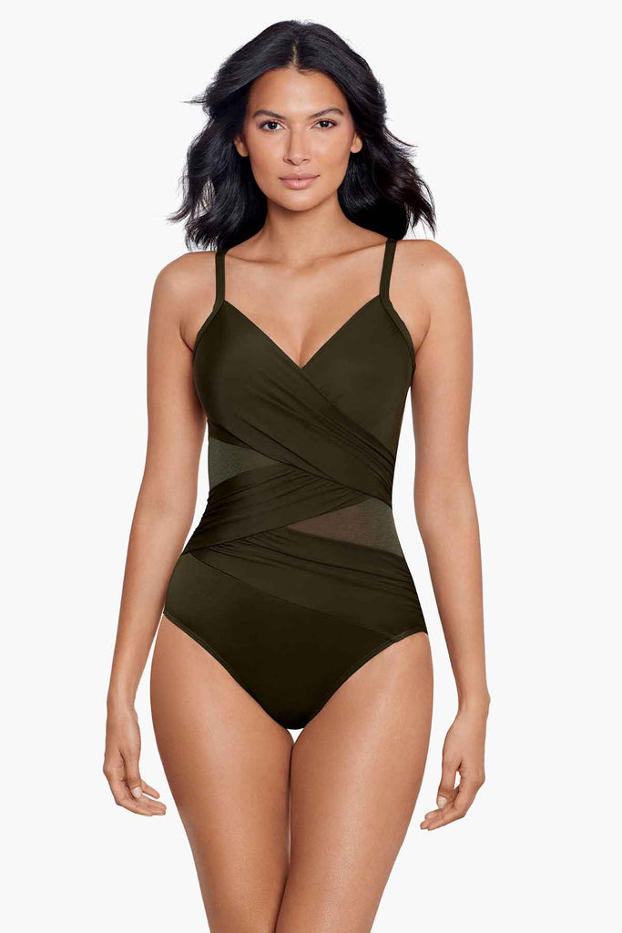 Slim woman wearing a one piece swim suit.