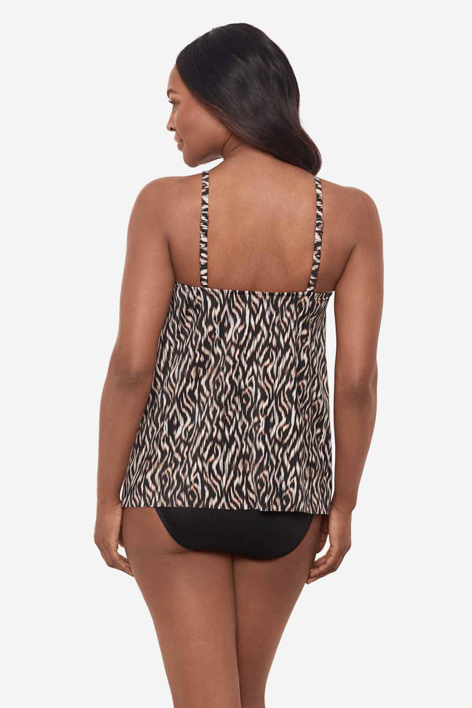 Woman facing away showing the back of a multicolor tankini top 