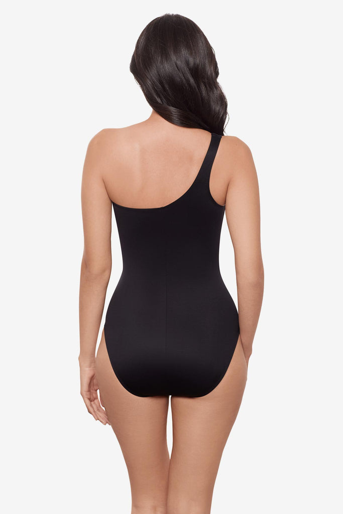 Woman turned away wearing a one shoulder sparkly black one-piece swimsuit