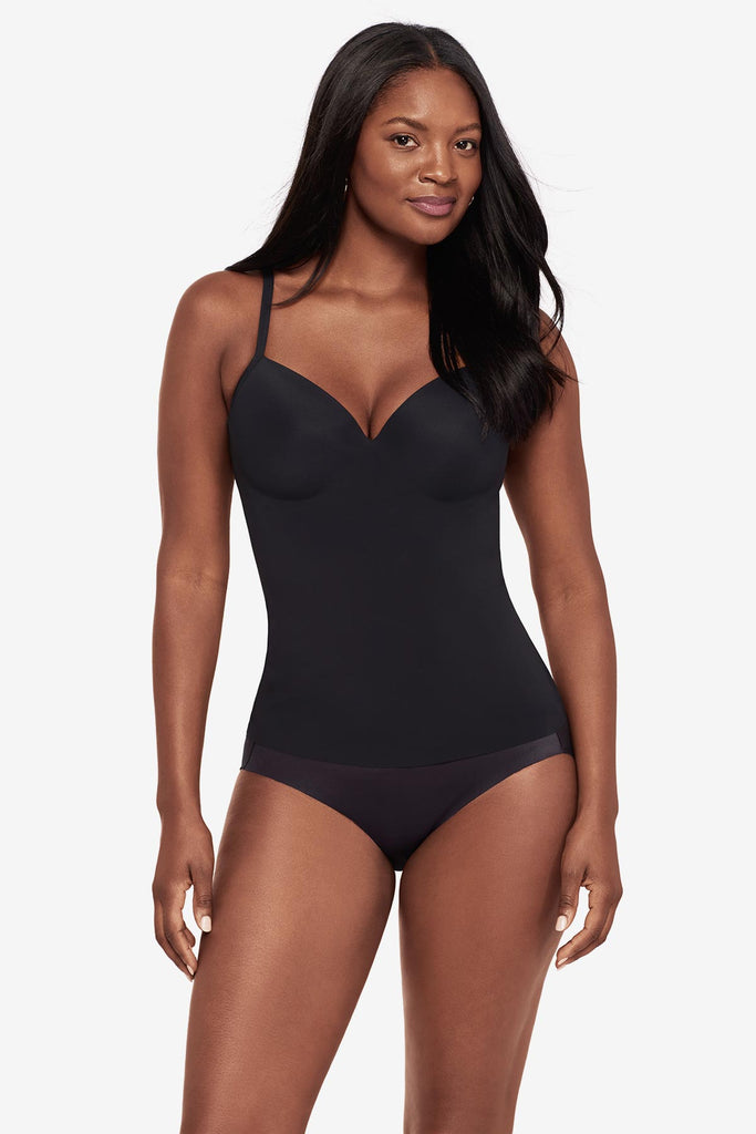 Woman wearing a black cupped bra cami top