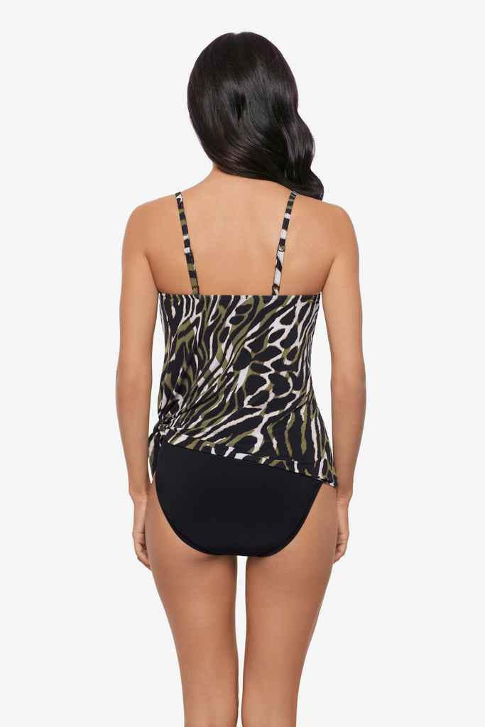 Woman turned away wearing a multicolored animal print tankini top