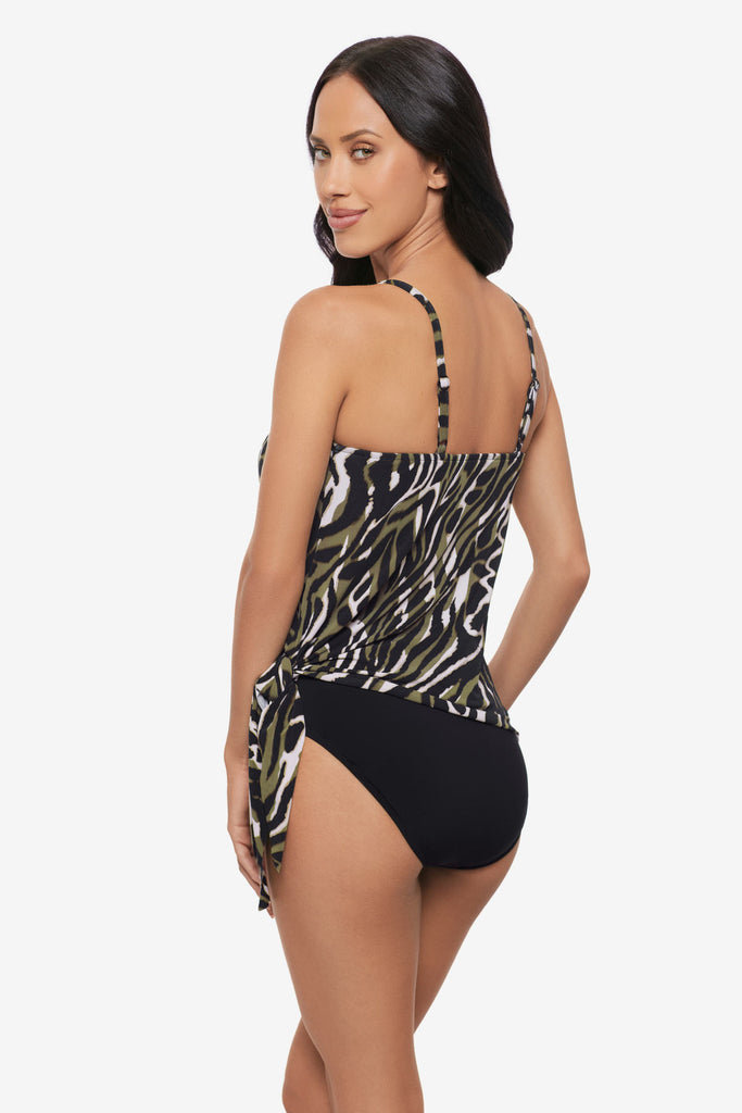 Woman turned left wearing a multicolored animal print tankini top