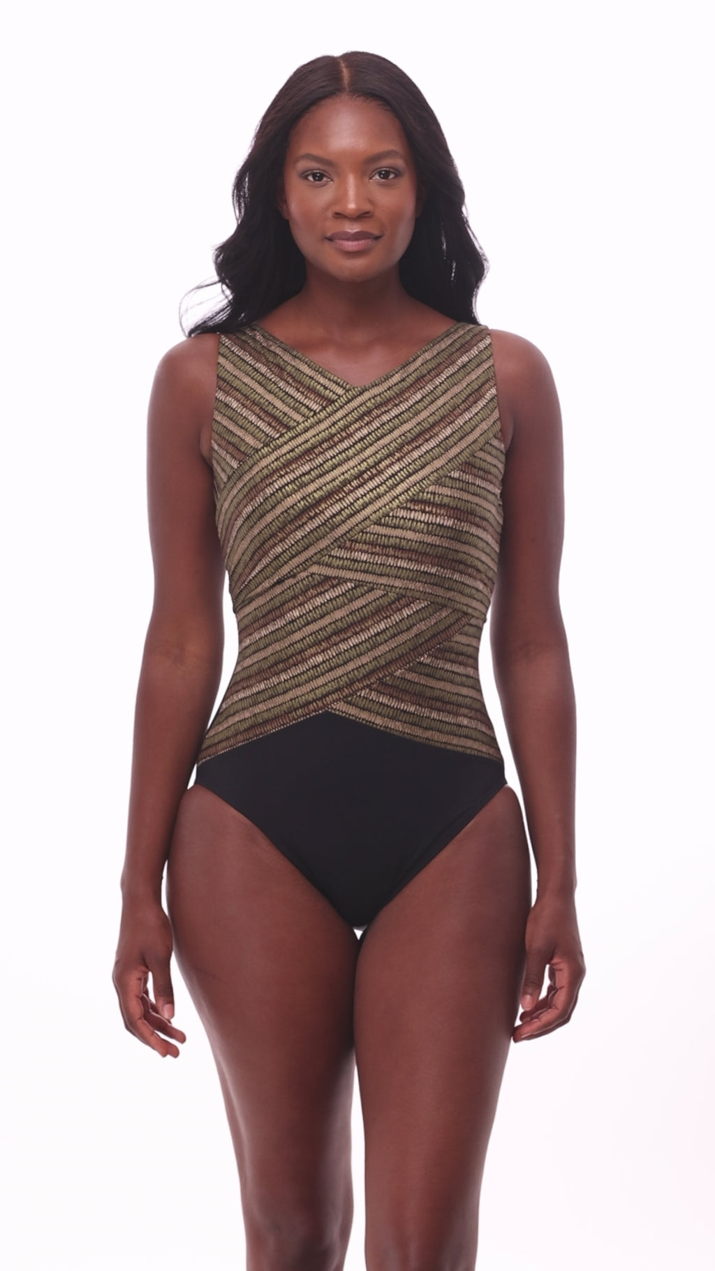 Woman wearing a shimmery golden brown high neck one-piece swimsuit