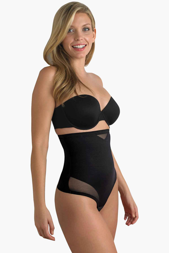 Woman in a miracle shapewear that cinches waist.