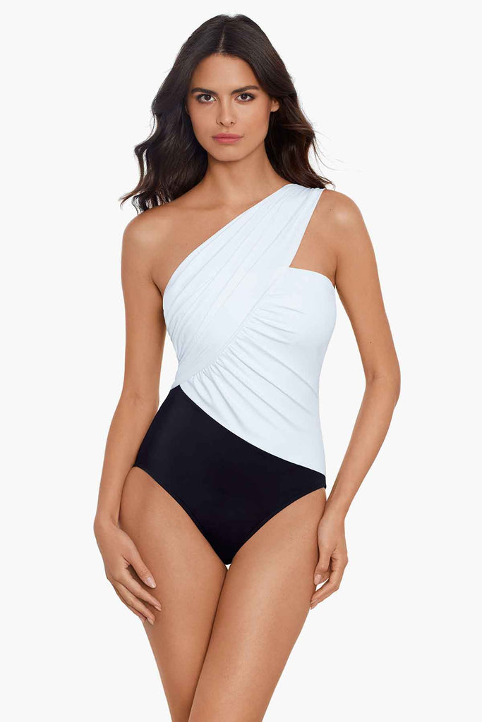 Woman in a stylish one piece swim suit.