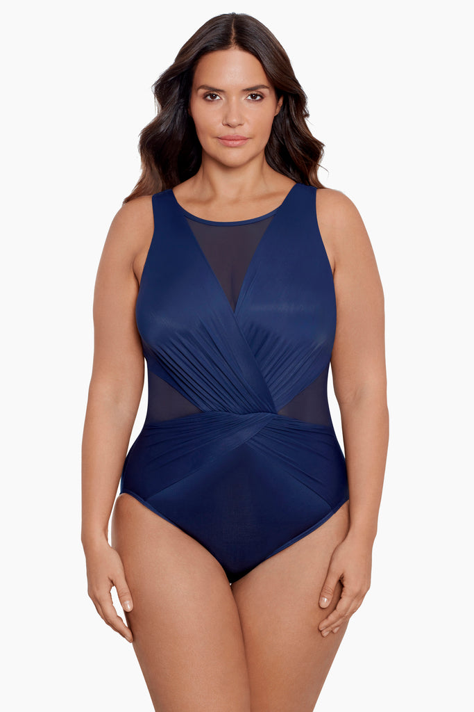 Young woman wearing a plus size swim suit.