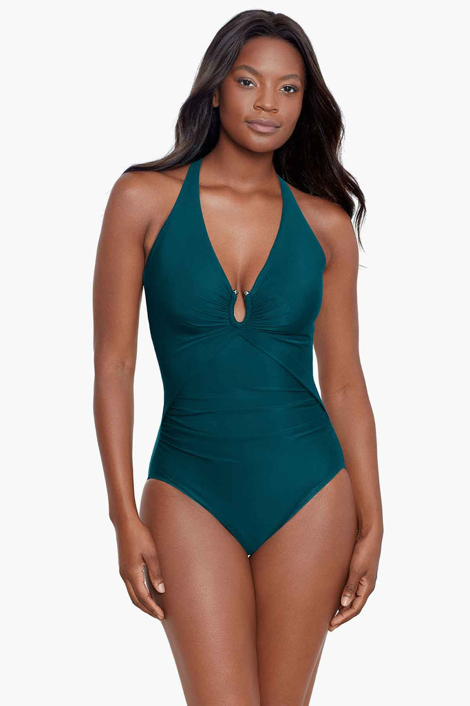 An african american woman wearing a stylish swimming costume.