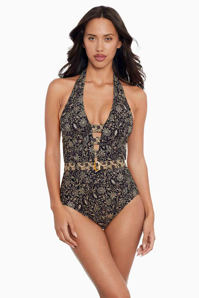 Woman in a  amoressa one piece swim suit.