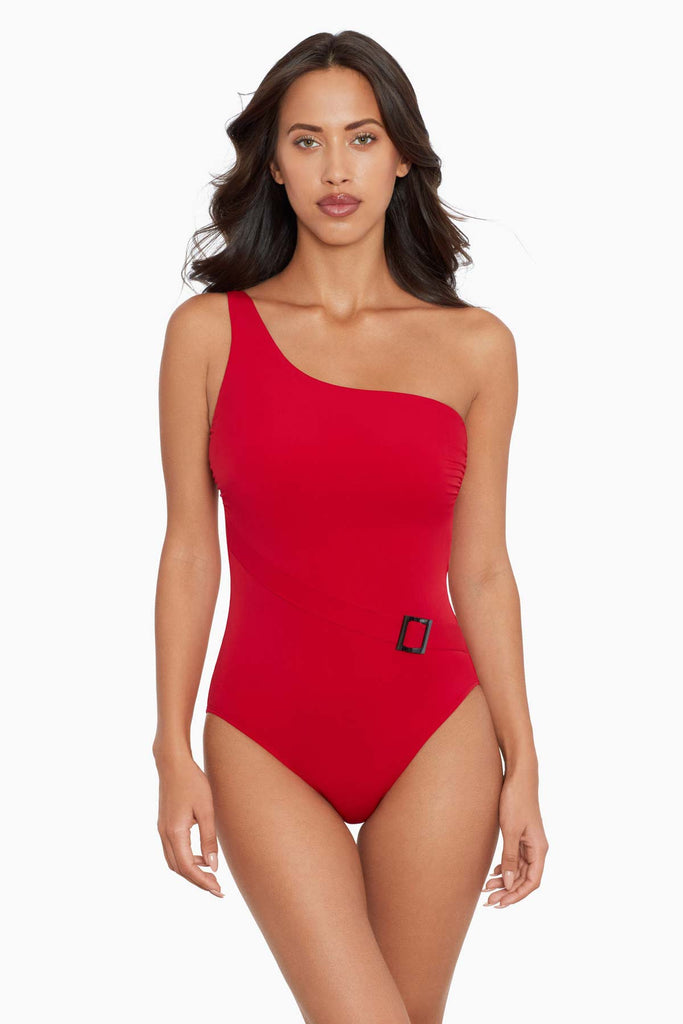 Woman wearing a one piece swim dress.