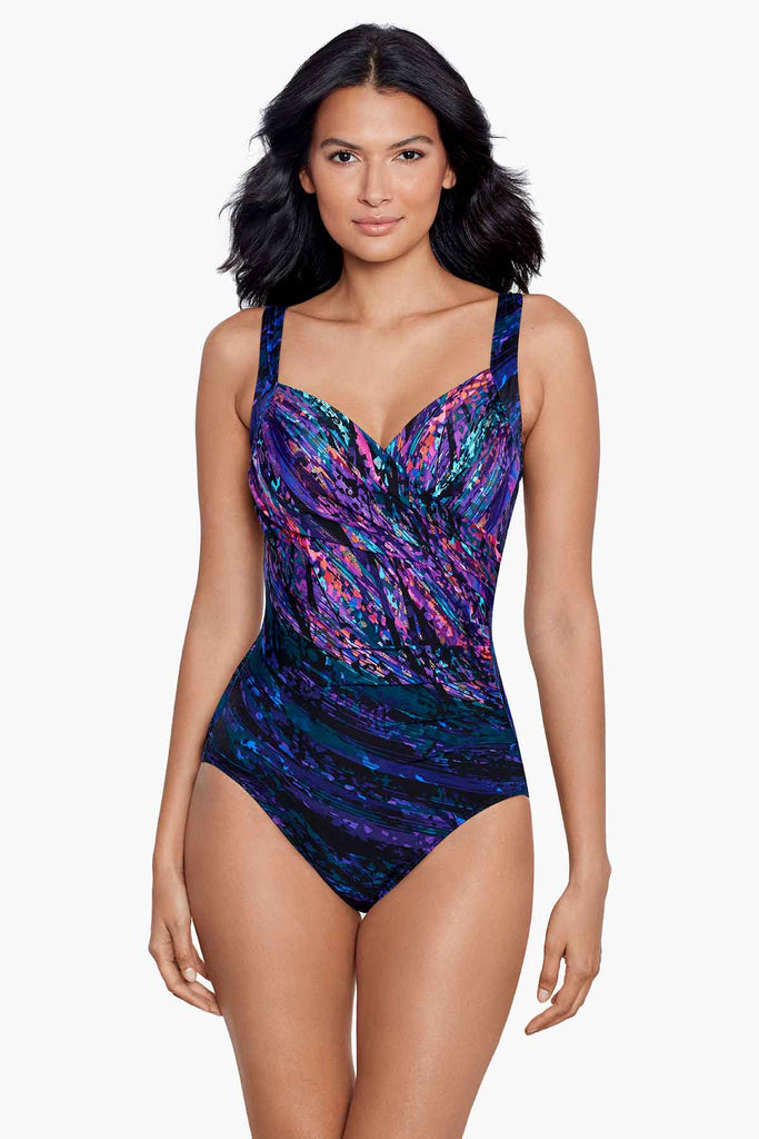 Woman in a printed swimming costume.