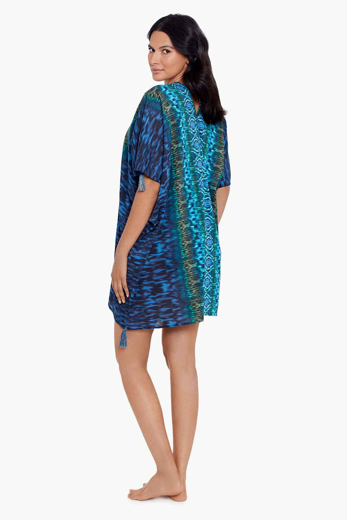 woman in a Miraclesuit Alhambra Caftan Cover Up