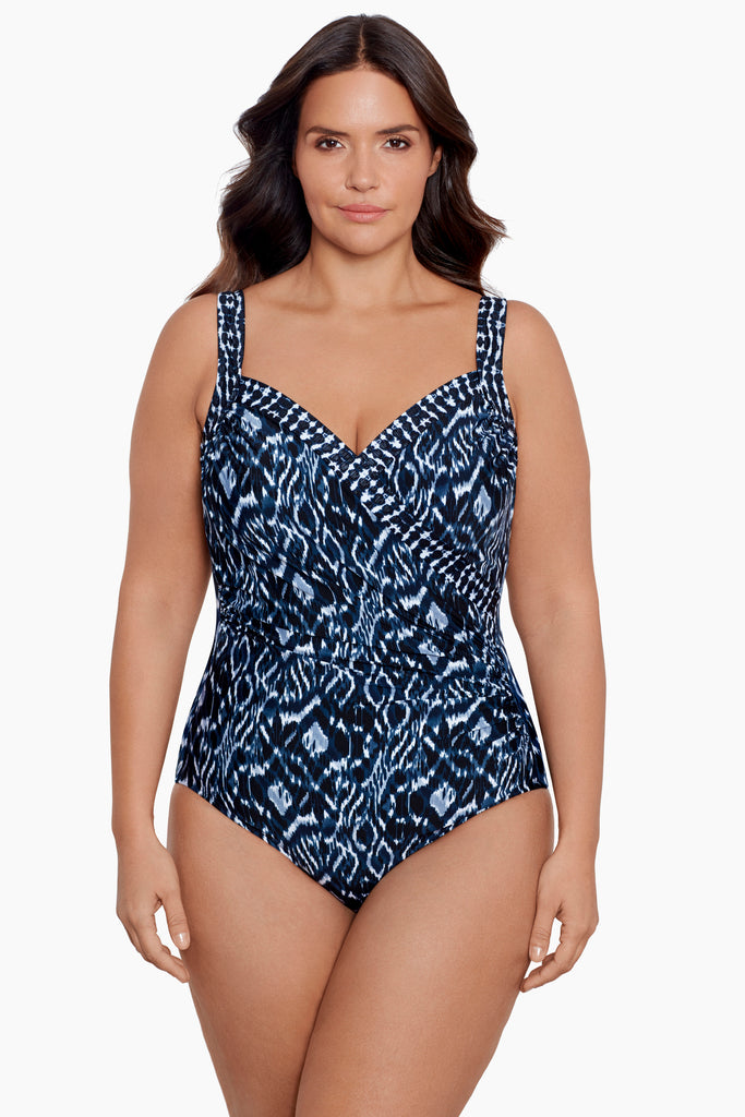 Young woman wearing a plus size swim suit.